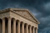 In this June 20, 2019 photo, The Supreme Court is seen under stormy skies in Washington. The justices on Monday left in place a Maryland court ruling that denied a new trial to Adnan Syed, who was convicted of strangling a high-school classmate he had once dated. (AP Photo/J. Scott Applewhite)