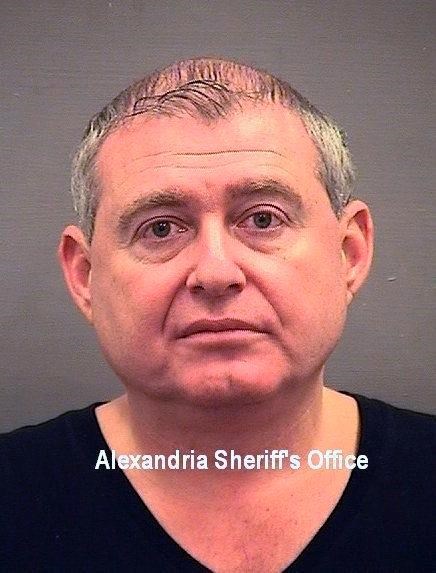 This image provided by the Alexandria Sheriff’s Office shows a booking mug shot of Lev Parnas. Lev Parnas and Igor Fruman, associates of Rudy Giuliani, were arrested on a four-count indictment that includes charges of conspiracy, making false statements to the Federal Election Commission and falsification of records. The men had key roles in Giuliani's efforts to launch a Ukrainian corruption investigation against Biden and his son, Hunter. (Alexandria Sheriff's Office via AP)