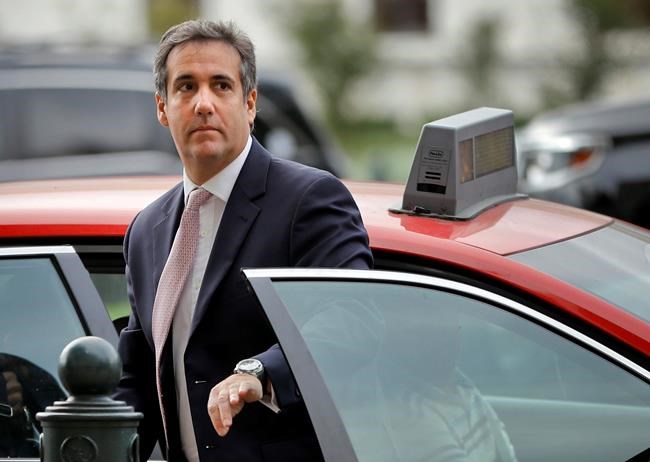 FILE - In this Sept. 19, 2017, file photo, Michael Cohen, President Donald Trump's personal attorney, steps out of a cab during his arrival on Capitol Hill in Washington. Cohen won't appear as scheduled before the House Oversight and Reform Committee on Feb. 7, 2019. Cohen's adviser Lanny Davis says the delay is on the advice of Cohen's lawyers because Cohen's still cooperating in special counsel Robert Mueller's Russia investigation. (AP Photo/Pablo Martinez Monsivais, file)