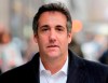 FILE - In this April 11, 2018, file photo, Michael Cohen, President Donald Trump's former attorney, walks along a sidewalk in New York. Cohen will testify publicly before Congress in February 2019. (AP Photo/Seth Wenig, File)