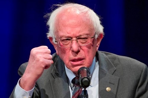 FILE - In this Nov. 27, 2018, file photo, Sen. Bernie Sanders, I-Vt., speaks about his new book at a George Washington University/Politics and Prose event in Washington. Leading congressional liberals are unveiling a package of bills that aims to reduce what Americans pay for prescription drugs by linking prices to lower costs in other countries. Sanders and Maryland Democratic Rep. Elijah Cummings plan to introduce three bills Thursday, Jan. 10, 2019. (AP Photo/Alex Brandon, File)