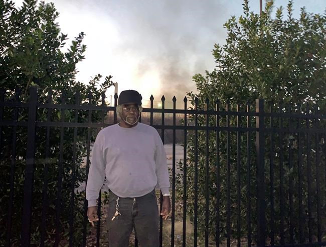 Charlie Powell stands outside one of the industrial sites at the 35th Avenue Superfund site in Birmingham, Ala., Wednesday, Jan. 9, 2019. The EPA has been removing contaminated soil from yards in the neighborhoods within the site. The partial government shutdown has forced suspension of federal work at the nation’s Superfund sites unless it is determined there is an “imminent threat” to life or property. (AP Photo/Kimberly Chandler)