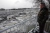 WAYNE GLOWACKI / WINNIPEG FREE PRESS
Stu McKay, owner of Cats on the Red outfitters, surveys the ice jam on the Red River from his deck just north of Lockport.