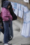 TREVOR HAGAN / WINNIPEG FREE PRESS
Celine Ponace, 11, checks out posters dedicated to some of the missing and murdered women.