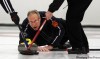 PHIL.HOSSACK@FREEPRESS.MB.CA
Kevin Larson puts the button in his sights during the Free Press event final at the Fort Rouge Curling Club on Monday night.