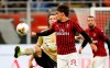 AC Milan's Lucas Paqueta, right, challenges for the ball with Spal's Jasmin Kurtic during the Serie A soccer match between AC Milan and Spal at the San Siro stadium, in Milan, Italy, Thursday, Oct. 31, 2019. (AP Photo/Antonio Calanni)