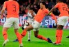 Germany's Serge Gnabry, third from right, scores his side's second goal during the Euro 2020 group C qualifying soccer match between Netherlands and Germany at the Johan Cruyff ArenA in Amsterdam, Sunday, March 24, 2019. (AP Photo/Peter Dejong)