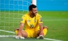 Ukraine's Junior Moraes sits on the pitch after missing a scoring chance during the Euro 2020 group B qualifying soccer match between Portugal and Ukraine at the Luz stadium in Lisbon, Friday, March 22, 2019. (AP Photo/Armando Franca)
