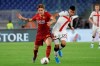 Roma's Nicolo Zaniolo, left, challenges for the ball with Genoa's Cristian Romero during the Serie A soccer match between Roma and Genoa at the Rome Olympic stadium, Sunday, Aug. 25, 2019. (AP Photo/Alessandra Tarantino)