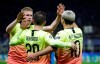 Manchester City's Bernardo Silva, center, celebrates with his teammates Sergio Aguero, right, and Kevin De Bruyne at the end of the Champions League group C soccer match between Atalanta and Manchester City at the San Siro stadium in Milan, Italy, Wednesday, Nov. 6, 2019. (AP Photo/Luca Bruno)