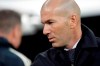 Real Madrid coach Zinedine Zidane stands by the bench before a Spanish La Liga soccer match between Real Madrid and Huesca at the Santiago Bernabeu stadium in Madrid, Sunday, March 31, 2019. (AP Photo/Bernat Armangue)