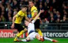 Tottenham defender Juan Foyth loses the ball to Dortmund midfielder Christian Pulisic, left, during the Champions League round of 16, first leg, soccer match between Tottenham Hotspur and Borussia Dortmund at Wembley stadium in London, Wednesday, Feb. 13, 2019. (AP Photo/Alastair Grant)