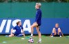 United States' Megan Rapinoe pauses during a training session of the US Women's Soccer team at a training ground in Lyon, France, Monday, July 1, 2019. The US will face England in a Women's World Cup semifinal match Tuesday in Lyon. (AP Photo/Laurent Cipriani)