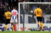 Young Boys' Jean-Pierre Nsame, left, scores his side's first goal from the penalty spot during the Europa League group G soccer match between FC Porto and Young Boys at the Dragao stadium in Porto, Portugal, Thursday, Sept. 19, 2019. (AP Photo/Luis Vieira)