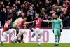 Arsenal's Alexandre Lacazette, right, reacts as West Ham's Declan Rice, 2nd right, celebrates after scoring the opening goal during the English Premier League soccer match between West Ham United and Arsenal at London Stadium in London, Saturday, Jan. 12, 2019. (AP Photo/Tim Ireland)