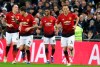 Manchester United's Marcus Rashford, 2nd right, celebrates after scoring the opening goal during the English Premier League soccer match between Tottenham Hotspur and Manchester United at Wembley stadium in London, England, Sunday, Jan. 13, 2019. (AP Photo/Tim Ireland)