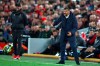 Porto coach Sergio Conceicao and Liverpool coach Juergen Klopp, left, react on the touchline during the Champions League quarterfinal, first leg, soccer match between Liverpool and FC Porto at Anfield Stadium, Liverpool, England, Tuesday April 9, 2019. (AP Photo/Dave Thompson)
