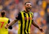 Watford's Troy Deeney celebrates after scoring his side's second goal during the English FA Cup semifinal soccer match between Watford and Wolverhampton Wanderers at Wembley Stadium in London, Sunday, April 7, 2019. (AP Photo/Tim Ireland)