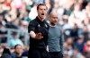 Fulham manager Scott Parker gestures, with Manchester City coach Pep Guardiola in the background, during the English Premier League soccer match between Fulham and Manchester City at Craven Cottage stadium in London, Saturday, March 30, 2019. (AP Photo/Alastair Grant)