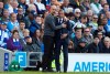 Manchester City coach Pep Guardiola and Brighton manager Chris Hughton, right, embrace each other during the English Premier League soccer match between Brighton and Manchester City at the AMEX Stadium in Brighton, England, Sunday, May 12, 2019. (AP Photo/Frank Augstein)