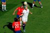 United States' Julie Ertz, center right, jumps for the ball with Chile's Su Helen Galaz during the Women's World Cup Group F soccer match between the United States and Chile at the Parc des Princes in Paris, Sunday, June 16, 2019. (AP Photo/Thibault Camus)