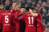 Liverpool's Alex Oxlade-Chamberlain, 3rd right, celebrates after scoring his side's second goal during the Champions League group E soccer match between Liverpool and Genk at Anfield Stadium, Liverpool, England, Tuesday, Nov. 5, 2019. (AP Photo/Jon Super)