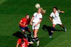 United States' Lindsey Horan, center, heads the ball during the Women's World Cup Group F soccer match between the United States and Chile at the Parc des Princes in Paris, Sunday, June 16, 2019. (AP Photo/Thibault Camus)