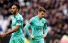 Arsenal's Aaron Ramsey and Pierre-Emerick Aubameyang, left, react during the English Premier League soccer match between West Ham United and Arsenal at London Stadium in London, Saturday, Jan. 12, 2019. (AP Photo/Tim Ireland)