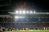Guy Fawkes Night fireworks go off outside the stadium during the Champions League group E soccer match between Liverpool and Genk at Anfield Stadium, Liverpool, England, Tuesday, Nov. 5, 2019. (AP Photo/Jon Super)