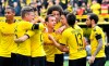 Dortmund's Mario Goetze, center, celebrates after scoring his side's third goal during the German Bundesliga soccer match between Borussia Dortmund and Fortuna Duesseldorf in Dortmund, Germany, Saturday, May 11, 2019. (AP Photo/Martin Meissner)