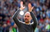 Manchester City coach Pep Guardiola celebrates after the English Premier League soccer match between Brighton and Manchester City at the AMEX Stadium in Brighton, England, Sunday, May 12, 2019. Manchester City defeated Brighton 4-1 to win the championship. (AP Photo/Frank Augstein)