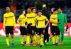 Dortmund players leave the field at the end of the Champions League round of 16, 2nd leg, soccer match between Borussia Dortmund and Tottenham Hotspur at the BVB stadium in Dortmund, Germany, Tuesday, March 5, 2019. Tottenham won 1-0. (AP Photo/Martin Meissner)