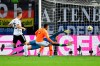 Netherlands' Donyell Malen, center, scores his side's third goal past Germany goalkeeper Manuel Neuer during the Euro 2020 group C qualifying soccer match between Germany and the Netherlands at the Volksparkstadion in Hamburg, Germany, Friday, Sept. 6, 2019. (AP Photo/Martin Meissner)