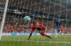 Liverpool's Sadio Mane, left, scores his side's first goal during the UEFA Super Cup soccer match between Liverpool and Chelsea, in Besiktas Park, in Istanbul, Wednesday, Aug. 14, 2019. (AP Photo/Thanassis Stavrakis)