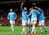 Manchester City's Leroy Sane, 2nd right, celebrates after scoring his side's second goal during the English Premier League soccer match between Manchester United and Manchester City at Old Trafford Stadium in Manchester, England, Wednesday April 24, 2019. (AP Photo/Jon Super)
