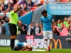 Manchester City's Leroy Sane lies injured on the ground after a collision with Liverpool's Trent Alexander-Arnold during the Community Shield soccer match between Manchester City and Liverpool at Wembley Stadium in London, Sunday, Aug. 4, 2019. (AP Photo/Frank Augstein)