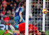 Tottenham Hotspur's Harry Winks turns and runs away to celebrate after scoring his sides 2nd goal during the English Premier League soccer match between Fulham and Tottenham Hotspur at Craven Cottage in London, Sunday, Jan. 20, 2019. (AP Photo/Frank Augstein)