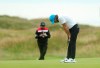 England's Tommy Fleetwood reacts after missing a putt on the 14th green during the third round of the British Open Golf Championships at Royal Portrush in Northern Ireland, Saturday, July 20, 2019.(AP Photo/Jon Super)