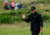 Brooks Koepka of the United States acknowledges the crowd after putting on the 9th green during the first round of the British Open Golf Championships at Royal Portrush in Northern Ireland, Thursday, July 18, 2019.(AP Photo/Matt Dunham)