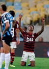 Bruno Henrique of Brazil's Flamengo, right, celebrates after scoring his side's first goal during Copa Libertadores semifinal second leg soccer match against Brazil's Gremio at the Maracana stadium in Rio de Janeiro, Brazil, Wednesday, Oct. 23, 2019. (AP Photo/Fabio Motta)