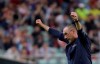 FILE - In this file photo taken on May 29, 2019, then Chelsea head coach Maurizio Sarri celebrates after winning the Europa League Final soccer match against Arsenal at the Olympic stadium in Baku, Azerbaijan. There will be some familiar new faces when the Italian league starts back up this weekend _ albeit in unfamiliar roles. Maurizio Sarri and Antonio Conte have returned to coach in Serie A in a shakeup of the top managerial roles rarely seen. (AP Photo/Luca Bruno)