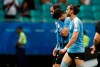 Uruguay's Luis Suarez, center, and teammates leave the field after losing against Peru in a penalty kick shoot-out during a during a Copa America quarterfinal soccer match at the Arena Fonte Nova in Salvador, Brazil, Saturday, June 29, 2019. (AP Photo/Natacha Pisarenko)