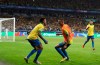 Brazil's Gabriel Jesus, left, celebrates with Richarlison his side's 2nd goal scored by teammate Roberto Firmino, right, during a Copa America semifinal soccer match against Argentina at the Mineirao stadium in Belo Horizonte, Brazil, Tuesday, July 2, 2019. (AP Photo/Ricardo Mazalan)