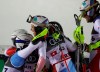 The Swiss team celebrates winning the gold medal in the finish area during the team event, at the alpine ski World Championships in Are, Sweden, Tuesday, Feb. 12, 2019. (AP Photo/Alessandro Trovati)
