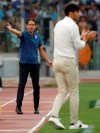 Lazio's head coach Simone Inzaghi gestures during a Serie A soccer match between Lazio and Roma, at the Rome Olympic stadium, Sunday, Sept. 1, 2019. (AP Photo/Alessandra Tarantino)