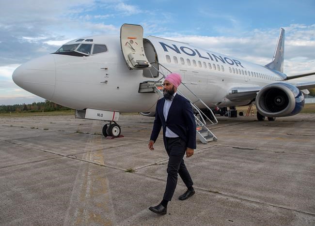 NDP Leader Jagmeet Singh heads from his airplane as he arrives in Miramichi, N.B. on Monday, Sept. 23, 2019. Singh is heading to Bathurst, N.B. for a campaign event before travelling to to Nova Scotia and then Manitoba. THE CANADIAN PRESS/Andrew Vaughan