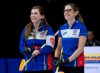 British Columbia skip Sarah Wark, left, and third Kristen Pilote share a light moment as they play Manitoba in tiebreaker action at the Scotties Tournament of Hearts at Centre 200 in Sydney, N.S. on Thursday, Feb. 21, 2019. British Columbia won 8-5 and advance to the championship pool. THE CANADIAN PRESS/Andrew Vaughan