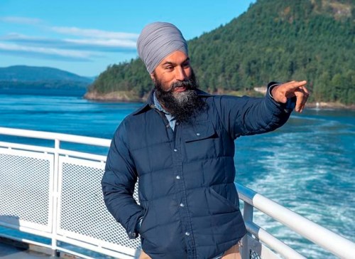 NDP Leader Jagmeet Singh takes in the sights after a media availability as he takes a ferry from Victoria to a campaign event in Vancouver on Saturday, Sept. 28, 2019. THE CANADIAN PRESS/Andrew Vaughan