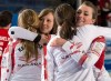 Canada's Alison Kreviazuk, Rachel Homan, Lisa Weagle and Emma Miskew, left to right, embrace after defeating the United States 8-6 to win the bronze medal game at the world women's curling championship in Riga, Latvia on Sunday, March 24, 2013. THE CANADIAN PRESS/Andrew Vaughan