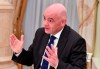 FIFA President Gianni Infantino gestures while speaking to Russian President Vladimir Putin in the Kremlin in Moscow, Russia, Wednesday, Feb. 20, 2019. (Yuri Kadobnov/Pool Photo via AP)